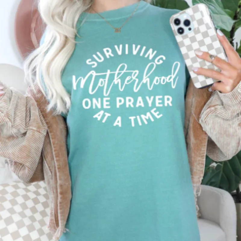 Surviving Motherhood One Prayer at a Time T-shirt Zippered Buttoned Snapped